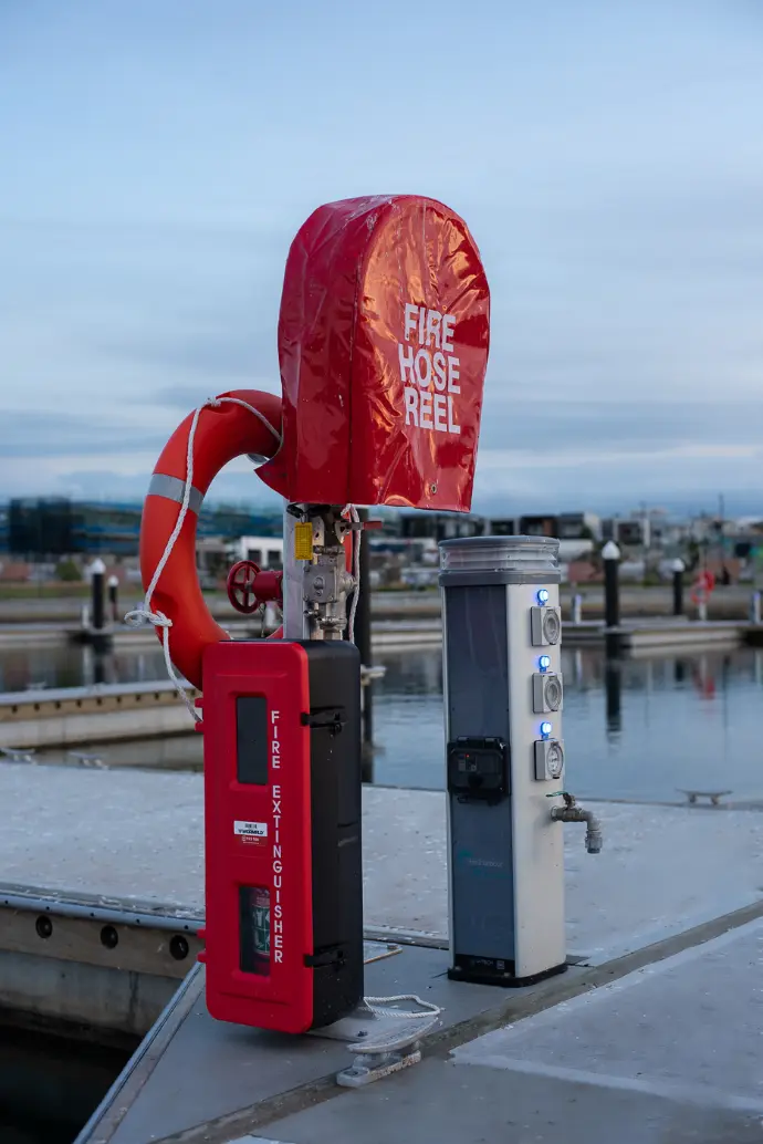 Fire hose reel and emergency station installed on a marina dock